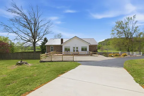 a house with garden in front of it