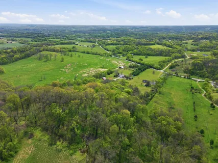 a view of a yard with an outdoor space