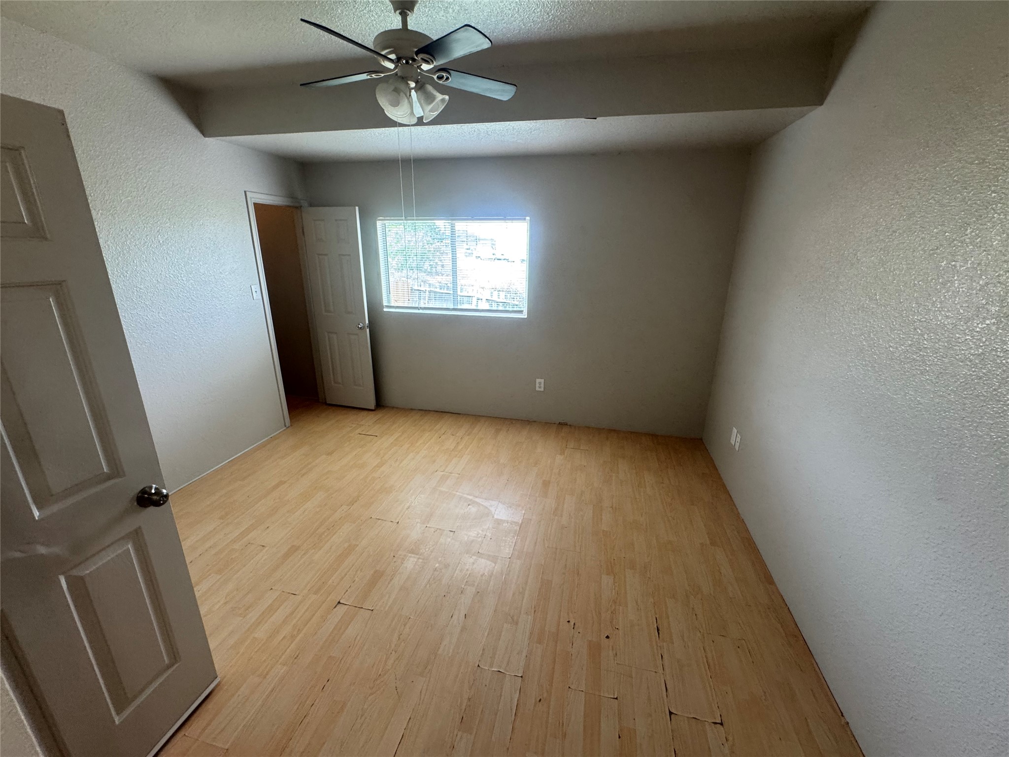4411 Terra Summit Road San Antonio, TX 78233 - Photo 10 of 11 Spacious room featuring wood-finish flooring and a ceiling fan with integrated lighting