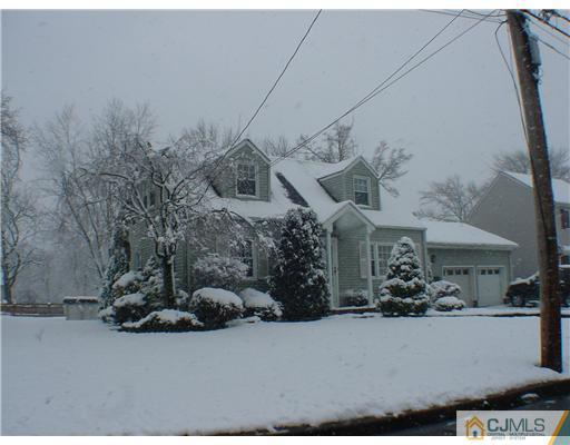 115 Morningside Road Colonia, NJ 07067 - Photo 1 of 2 an aerial view of a house with a yard and large tree
