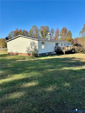 a view of a swimming pool and an outdoor seating