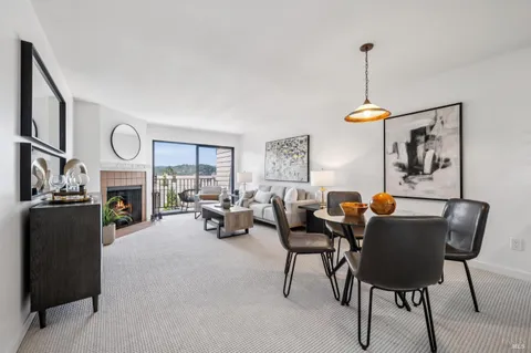 a view of staircase with white walls and windows