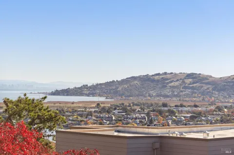 a view of a city and ocean view