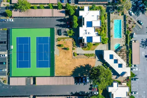 a view of street with sitting area