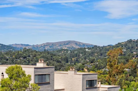 a view of a city with mountain