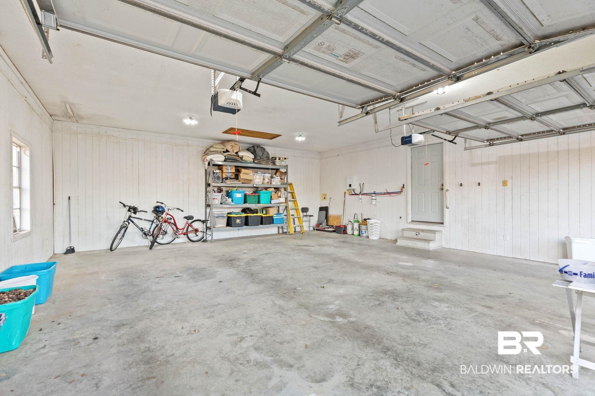 21267 Loop Road Andalusia, AL 36421 - Photo 50 of 72 Garage with a garage door opener