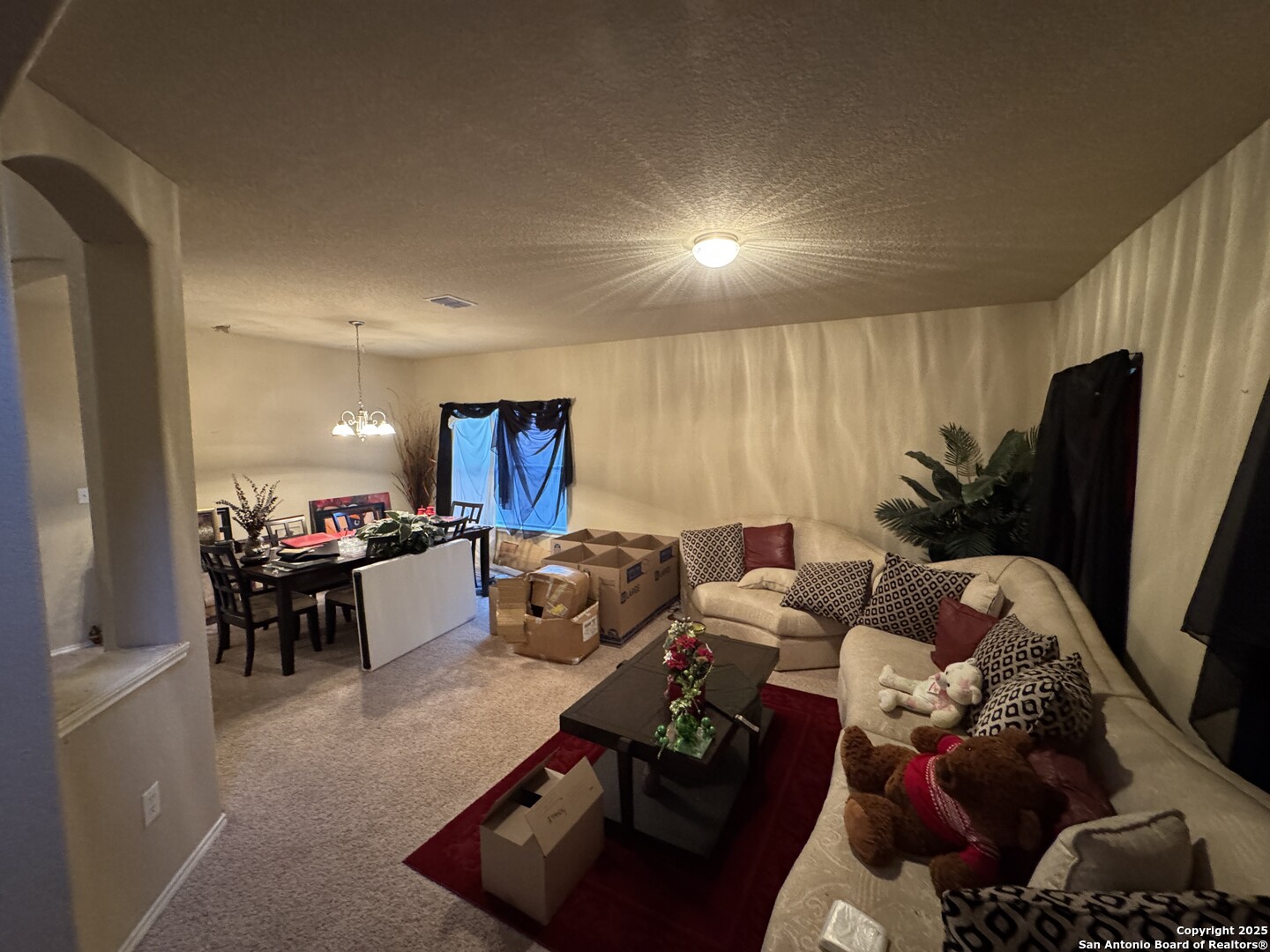 6714 Harbor Fields Converse, TX 78109 - Photo 16 of 29 a living room with furniture and a flat screen tv