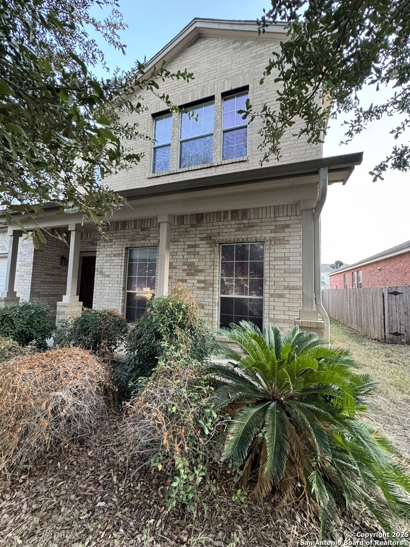 6714 Harbor Fields Converse, TX 78109 - Photo 2 of 29 a front view of a house with a garden