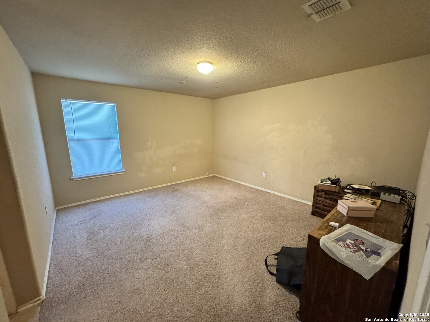 6714 Harbor Fields Converse, TX 78109 - Photo 3 of 29 a view of room with furniture and air conditioner vent