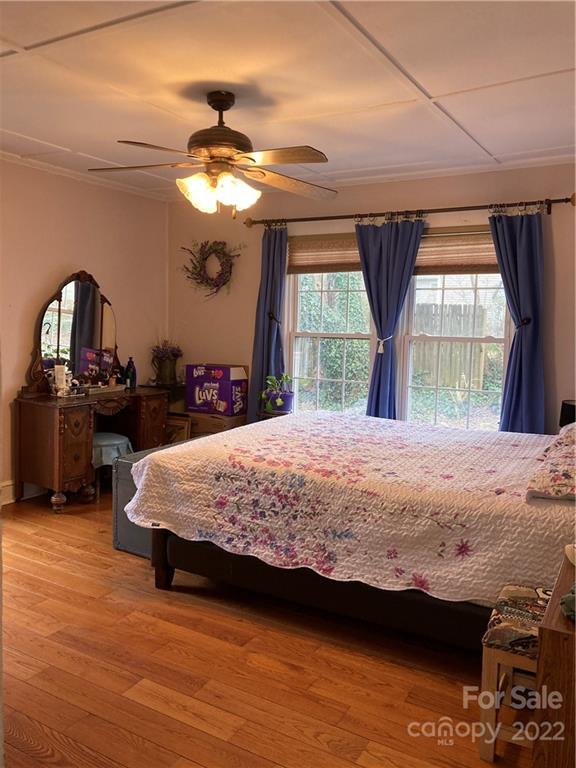 135 Allen Street Rutherfordton, NC 28139 - Photo 4 of 10 a bedroom with a bed dresser and window