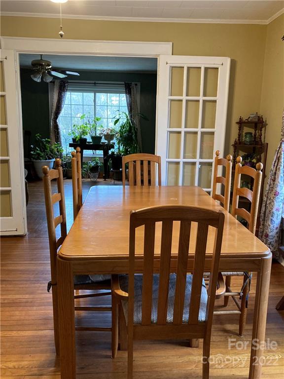 135 Allen Street Rutherfordton, NC 28139 - Photo 6 of 10 a view of a dining room with furniture window and wooden floor