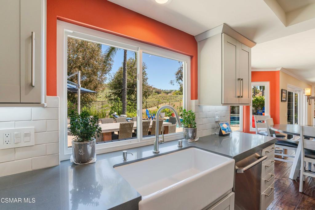 764 Coldbrook Place Simi Valley, CA 93065 - Photo 12 of 56 a kitchen with a sink and a large window