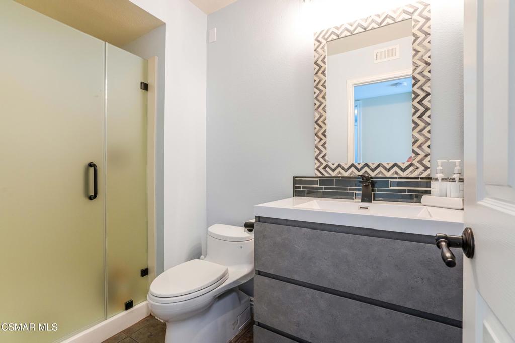 764 Coldbrook Place Simi Valley, CA 93065 - Photo 22 of 56 a bathroom with a sink toilet and mirror