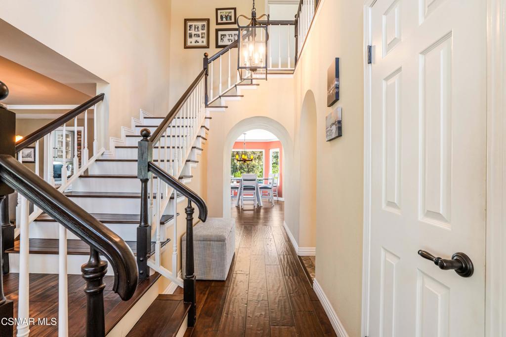 764 Coldbrook Place Simi Valley, CA 93065 - Photo 23 of 56 a view of staircase with wooden floor and white walls