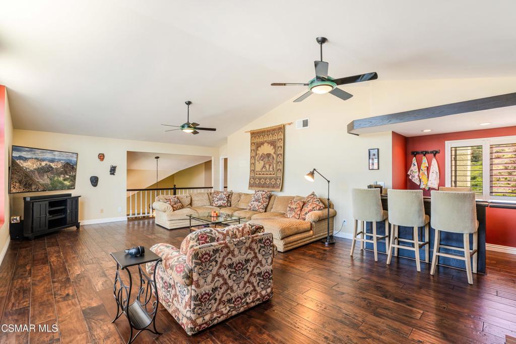 764 Coldbrook Place Simi Valley, CA 93065 - Photo 26 of 56 a living room with furniture or wooden floor and a chandelier