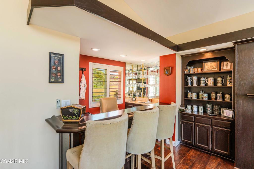 764 Coldbrook Place Simi Valley, CA 93065 - Photo 28 of 56 a dining room with furniture and wooden floor