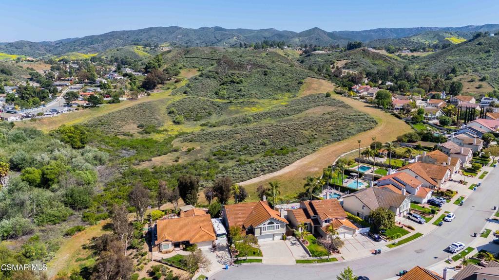 764 Coldbrook Place Simi Valley, CA 93065 - Photo 3 of 56 an aerial view of a house with a mountain