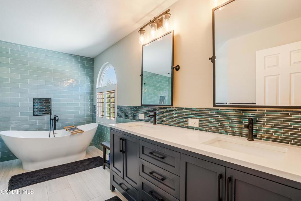 764 Coldbrook Place Simi Valley, CA 93065 - Photo 31 of 56 a bathroom with a sink and a mirror