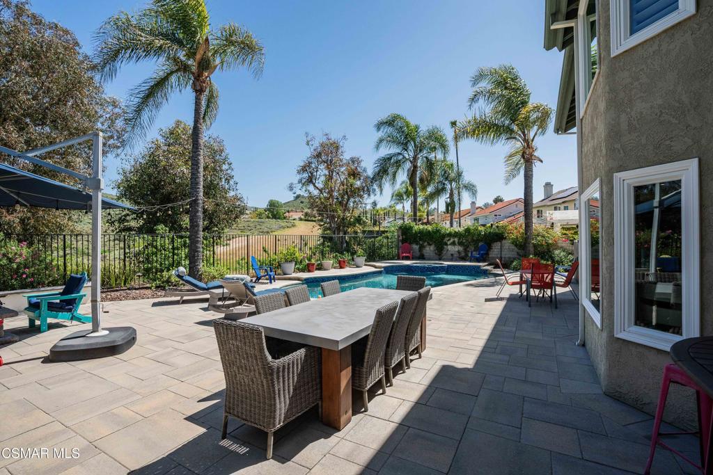 764 Coldbrook Place Simi Valley, CA 93065 - Photo 36 of 56 a view of a patio with swimming pool table and chairs