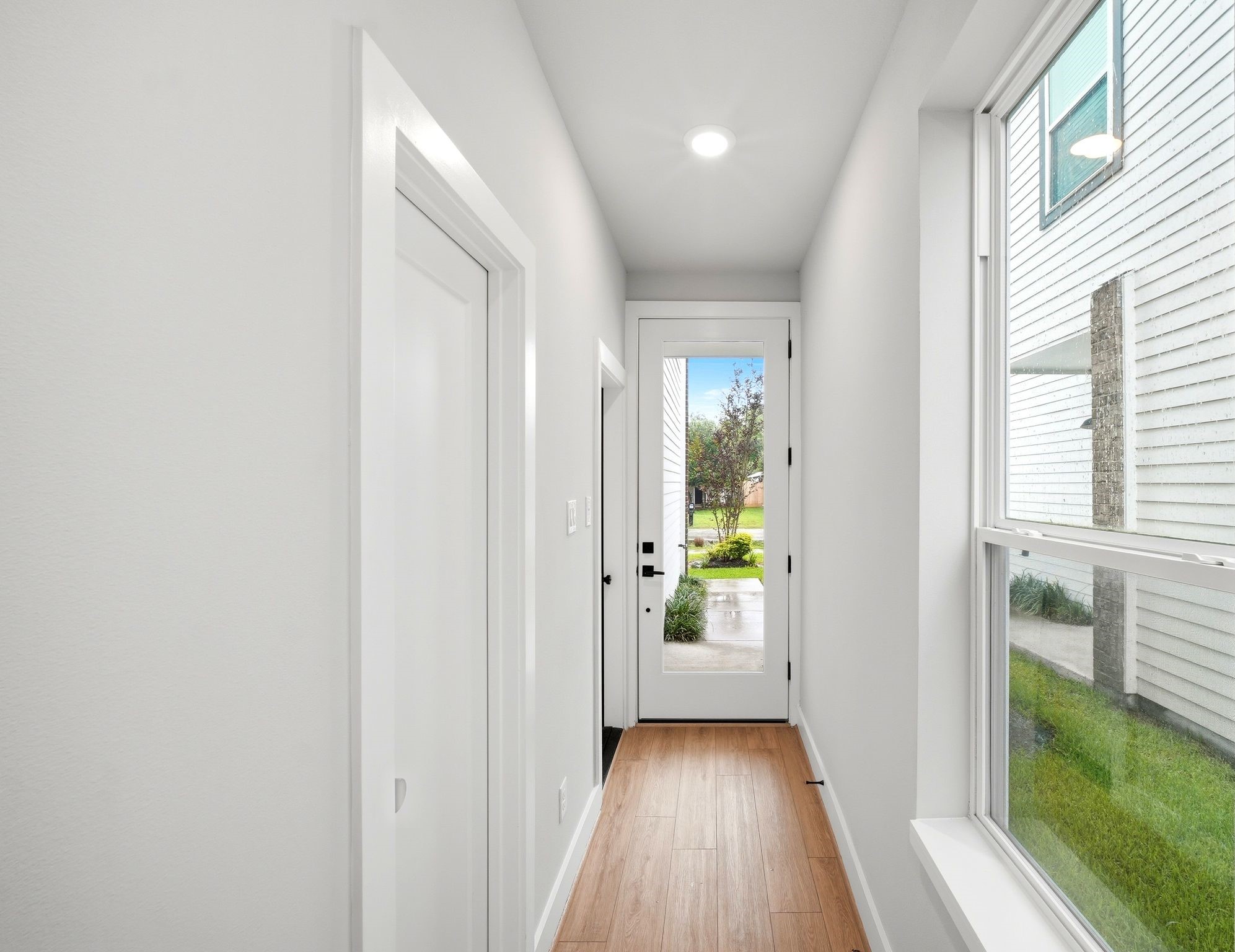 5814 Cebra Street Houston, TX 77091 - Photo 4 of 32 Welcoming entry with clean lines and direct view into the open living space.
