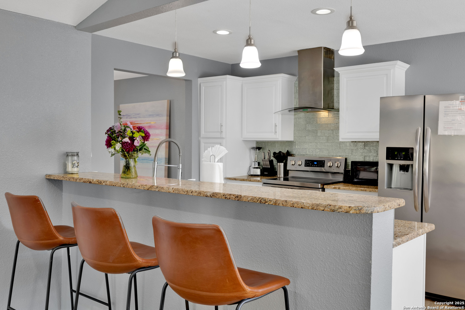 103 Shalimar Drive Castle Hills, TX 78213 - Photo 22 of 56 a kitchen with stainless steel appliances granite countertop a sink window and chairs