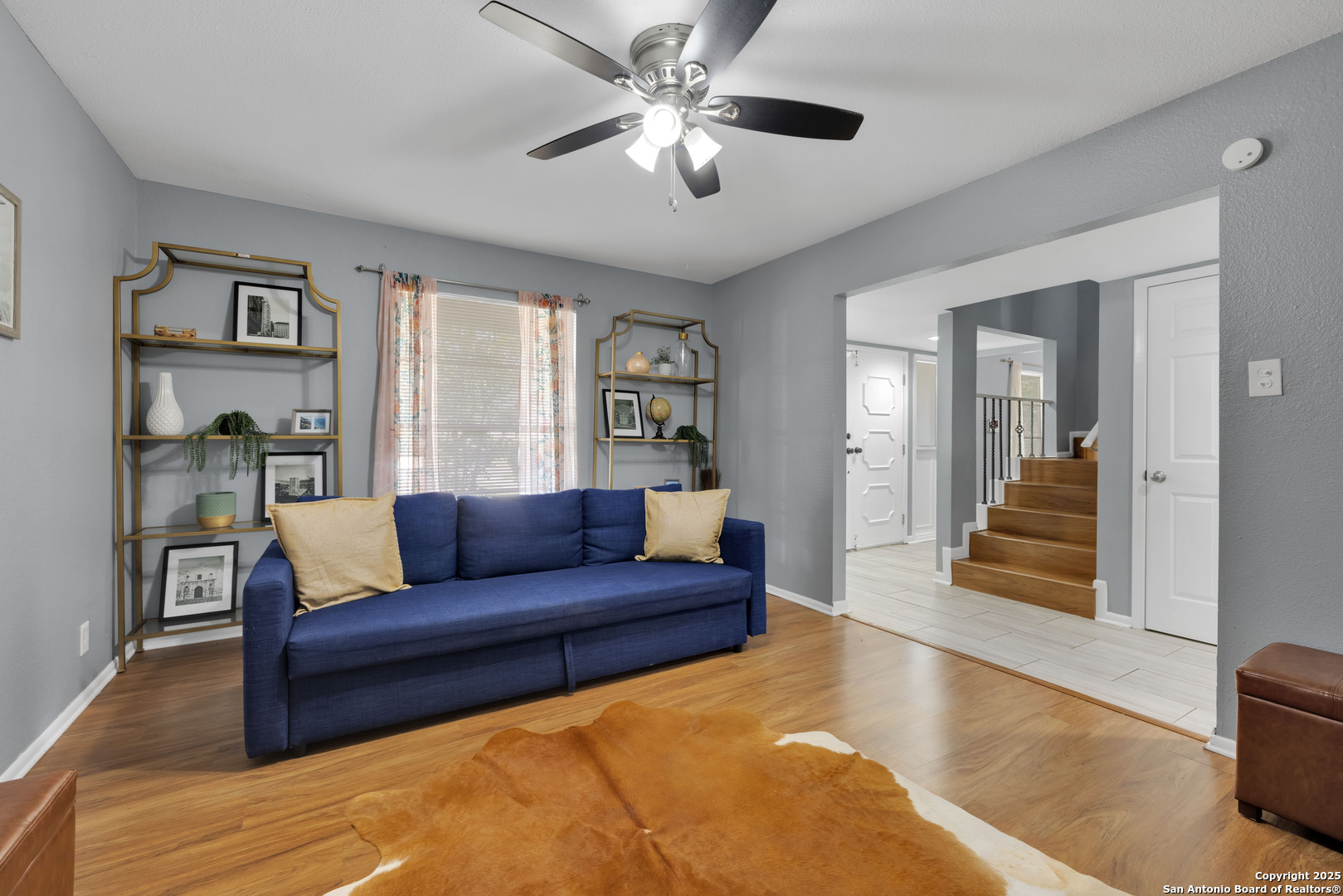 103 Shalimar Drive Castle Hills, TX 78213 - Photo 34 of 56 a living room with furniture and a chandelier