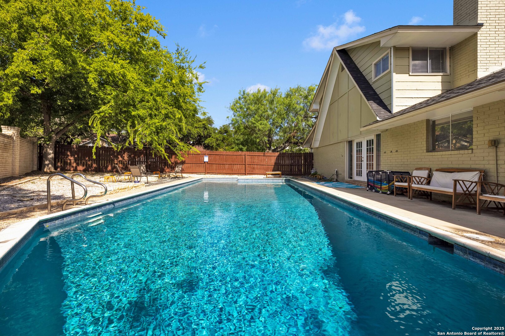 103 Shalimar Drive Castle Hills, TX 78213 - Photo 54 of 56 a backyard of a house with table and chairs
