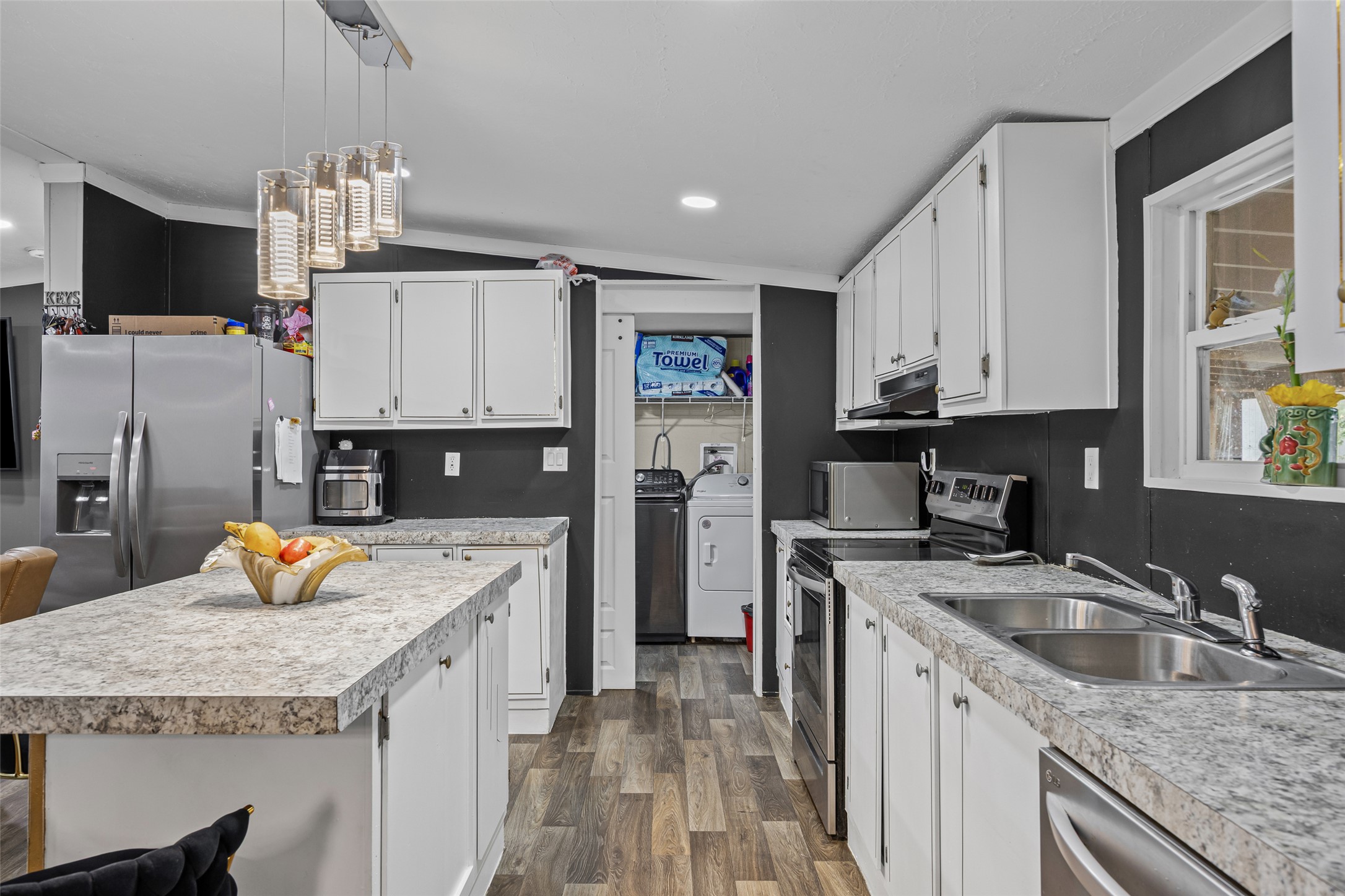 564 Boyd Road Red Rock, TX 78662 - Photo 20 of 25 A well-equipped culinary space boasts ample counter space and a convenient laundry area.