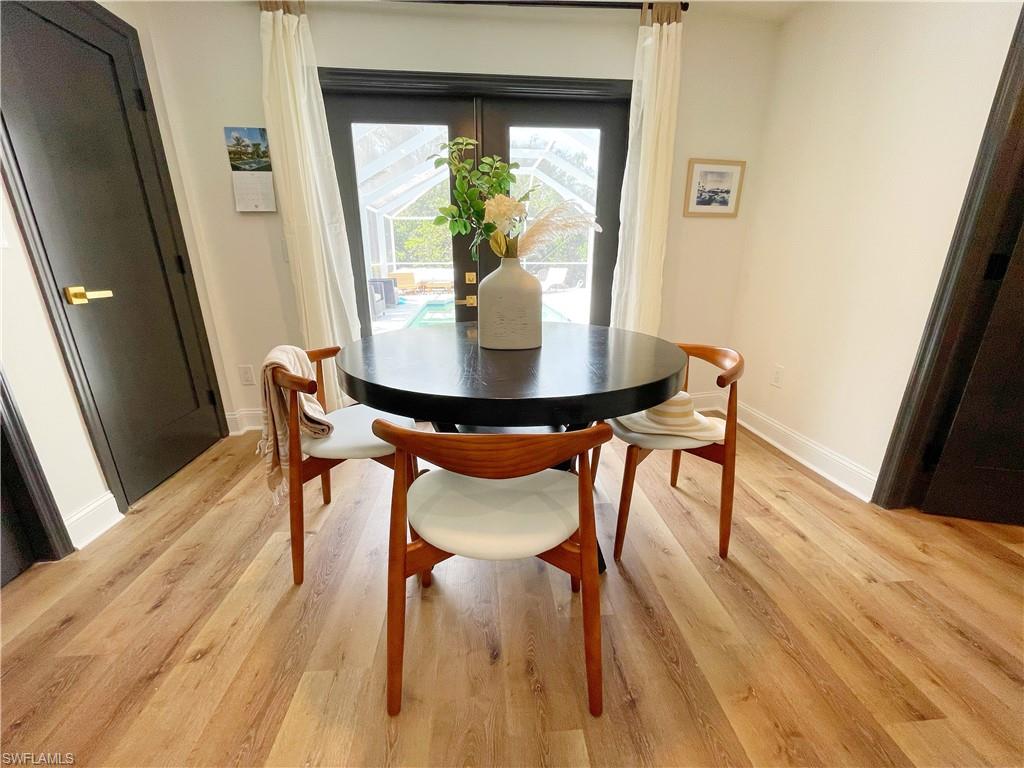 4811 Gary Road Bonita Springs, FL 34134 - Photo 30 of 35 Dining space with light wood-type flooring and baseboards