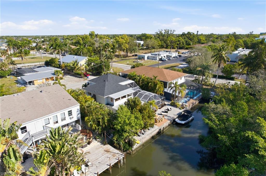 4811 Gary Road Bonita Springs, FL 34134 - Photo 34 of 35 Aerial view of residential area featuring a large body of water