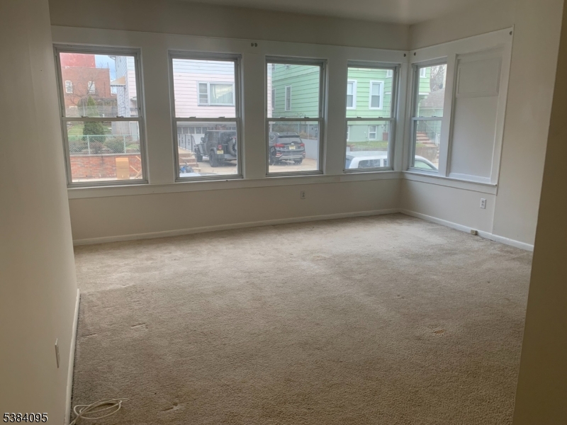 10 Exchange Place Clifton, NJ 07011 - Photo 18 of 19 an empty room with windows
