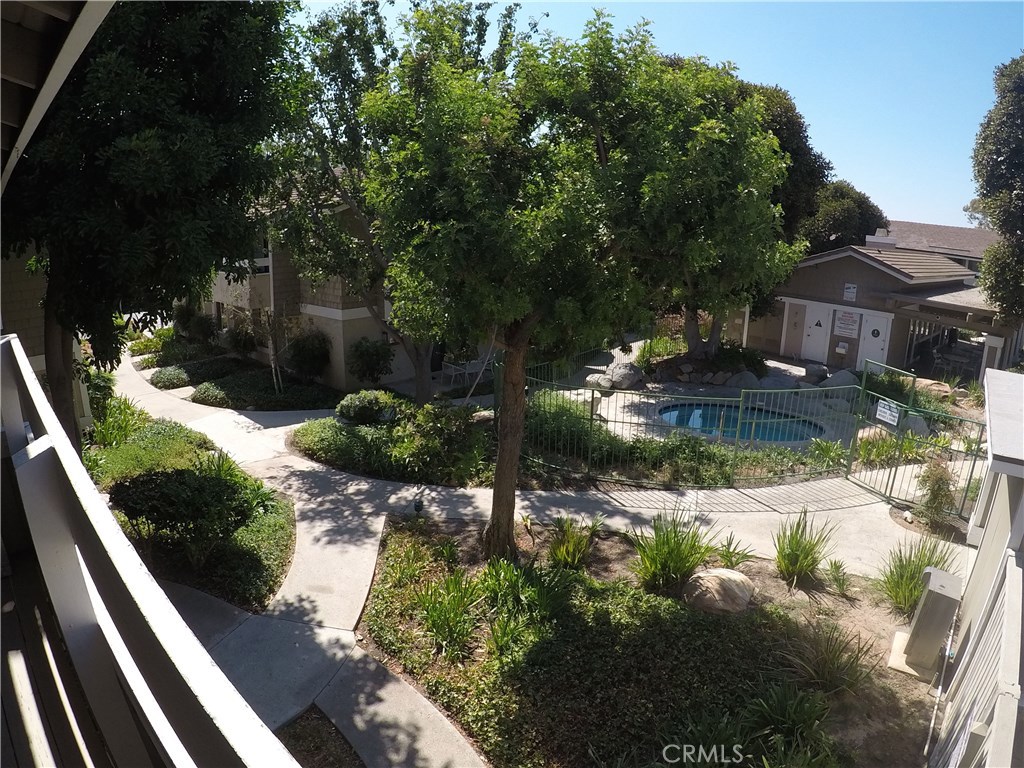 a view of swimming pool from a balcony