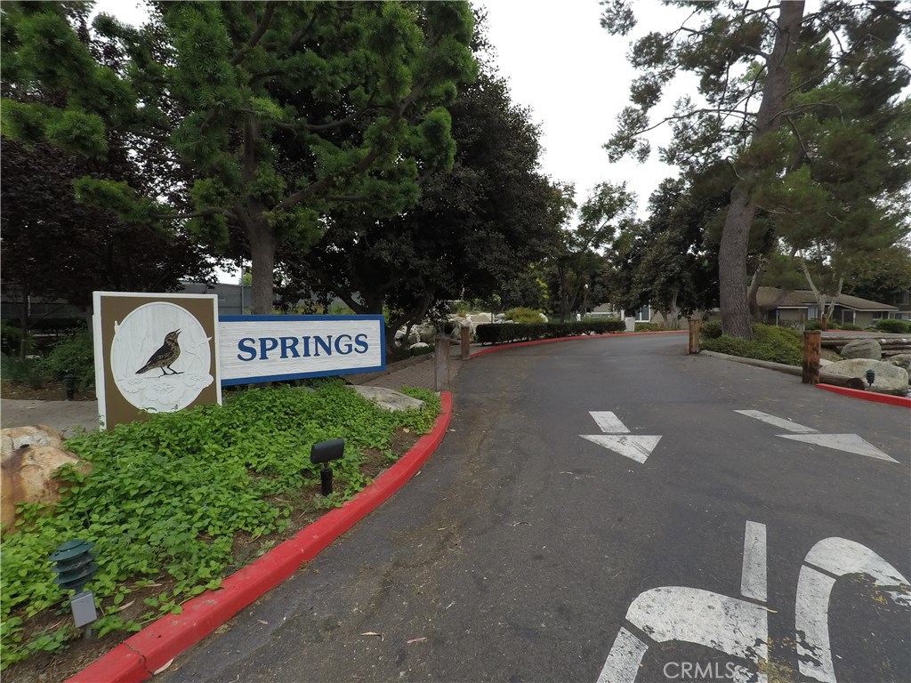 230 Springview Irvine, CA 92620 - Photo 22 of 30 a view of a street with benches and trees