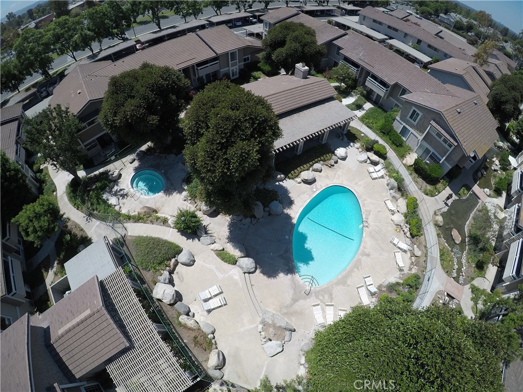230 Springview Irvine, CA 92620 - Photo 23 of 30 an aerial view of a house with a swimming pool
