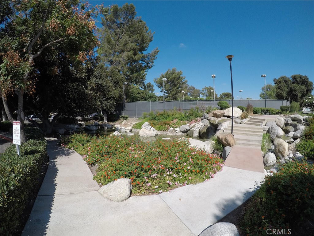 230 Springview Irvine, CA 92620 - Photo 28 of 30 a view of a lake with a house