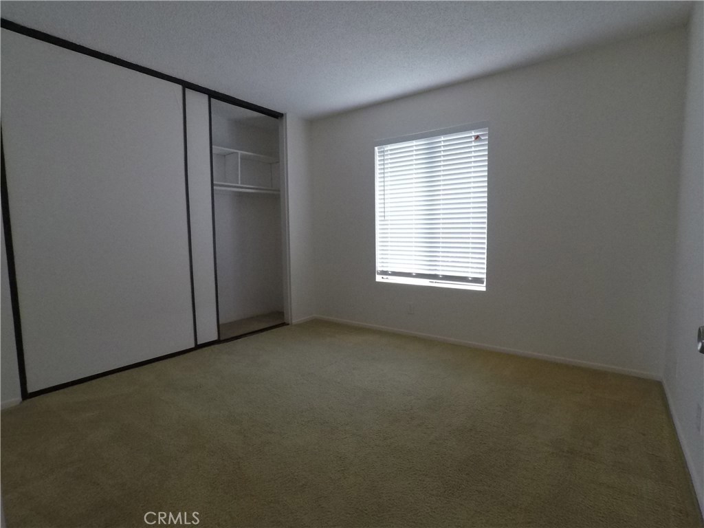 230 Springview Irvine, CA 92620 - Photo 10 of 30 an empty room with windows