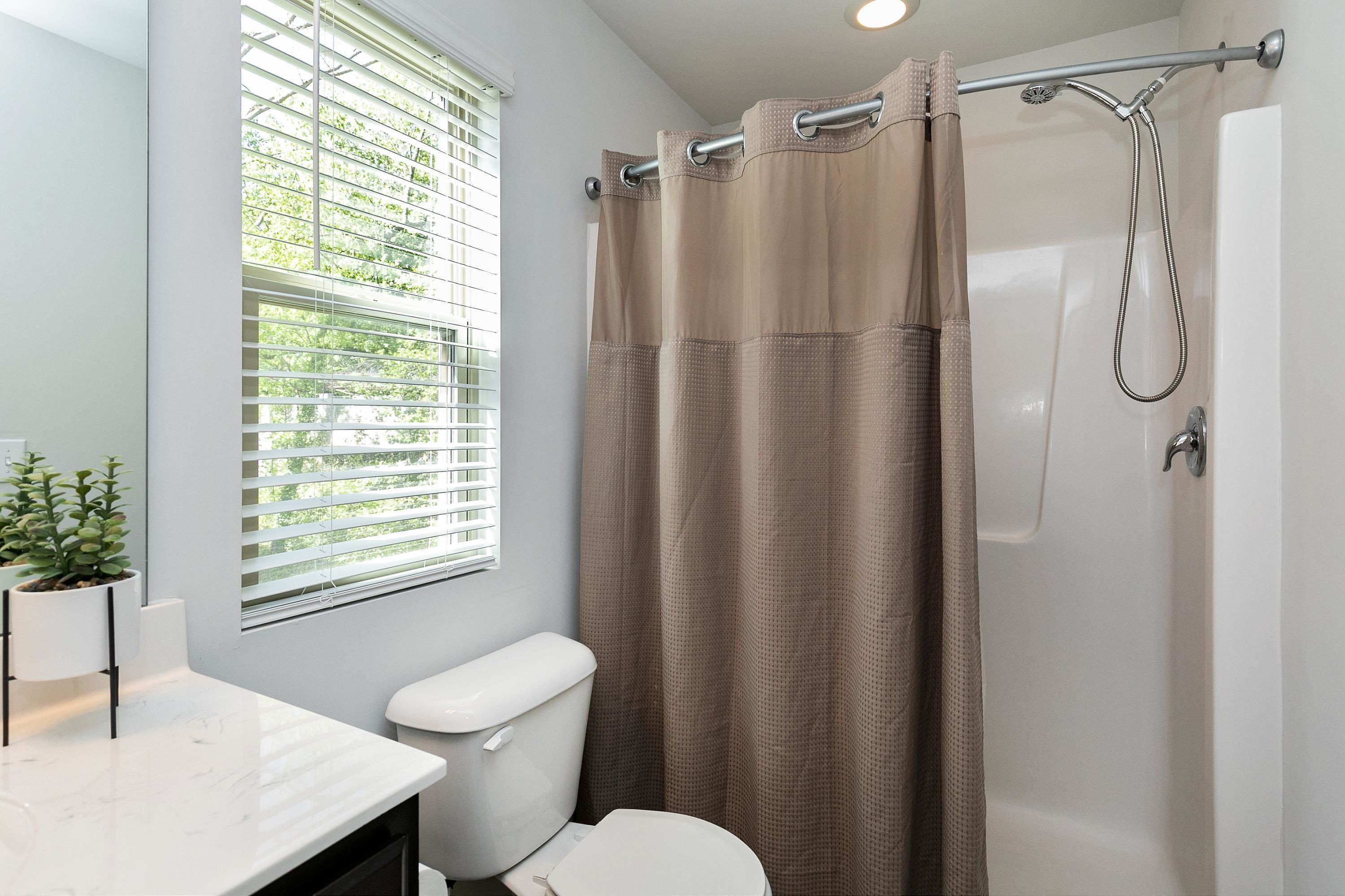 228 Spark Street Raleigh, NC 27606 - Photo 18 of 28 Easy step right in shower