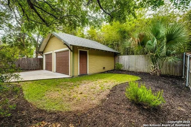 a house view with a backyard space