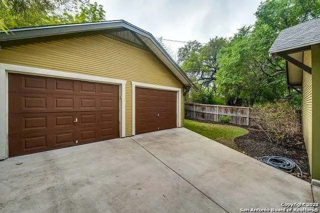 a view of backyard with green space