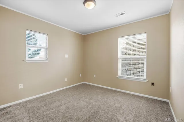 an empty room with sliding door