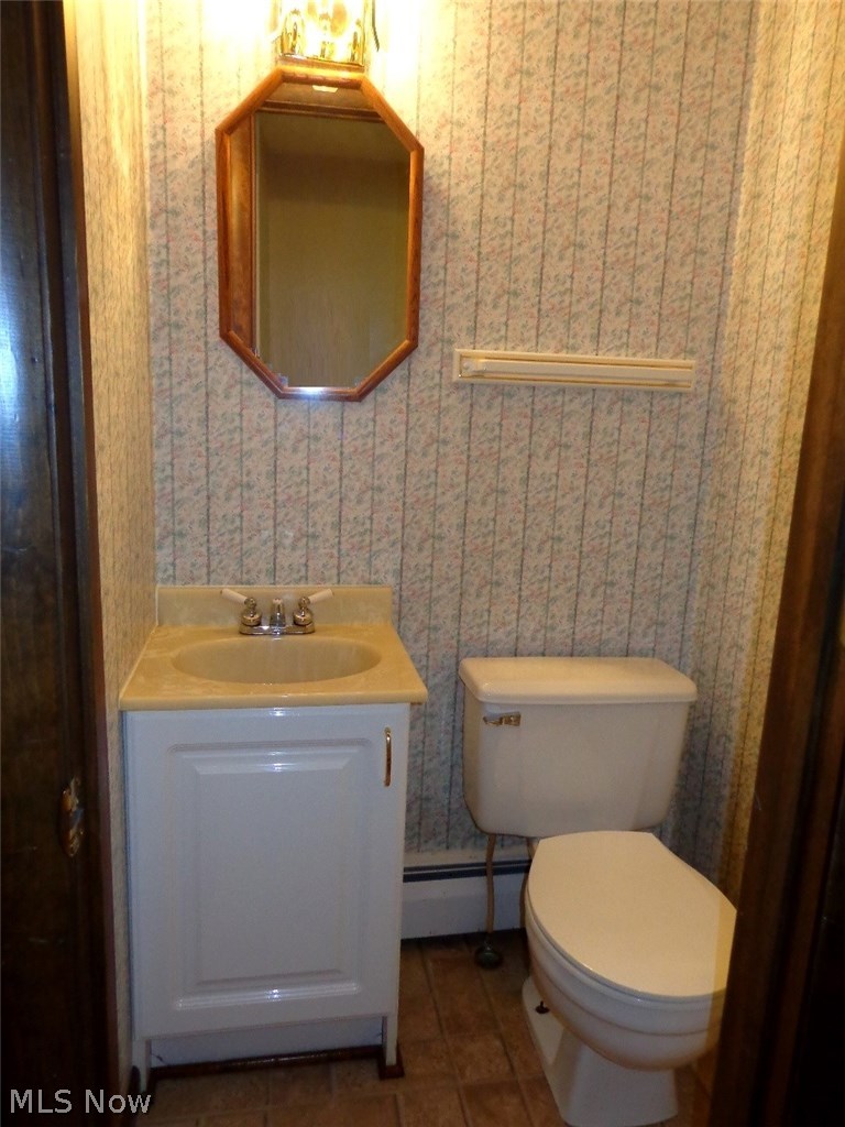 11167 Robson Road Grafton, OH 44044 - Photo 19 of 33 The half bath is off the kitchen