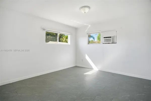 an empty room with a window