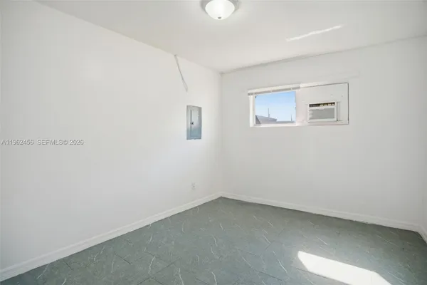 an empty room with a window