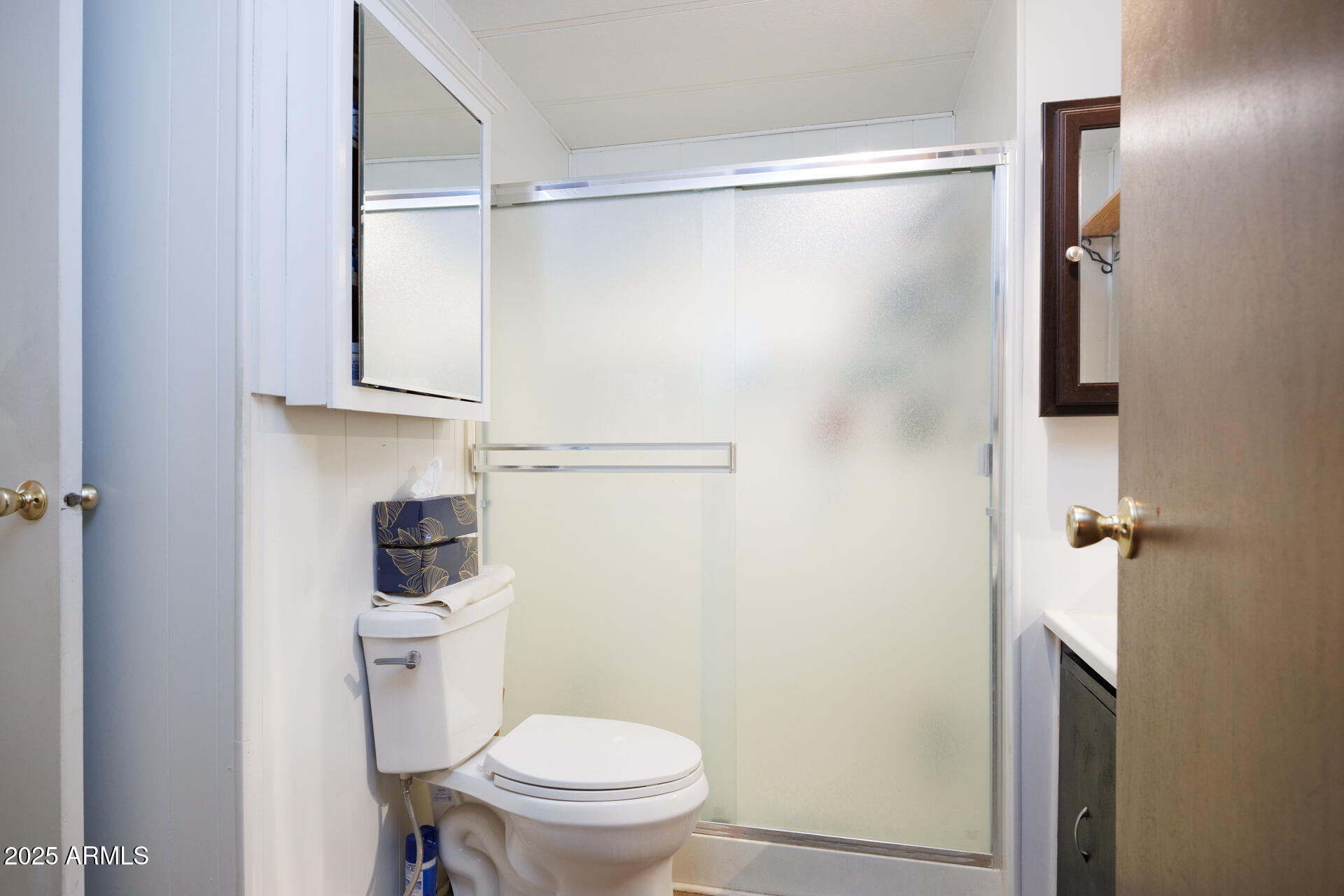 2100 North Trekell Road, Unit 333 Casa Grande, AZ 85122 - Photo 19 of 39 a bathroom with a shower a toilet and a sink