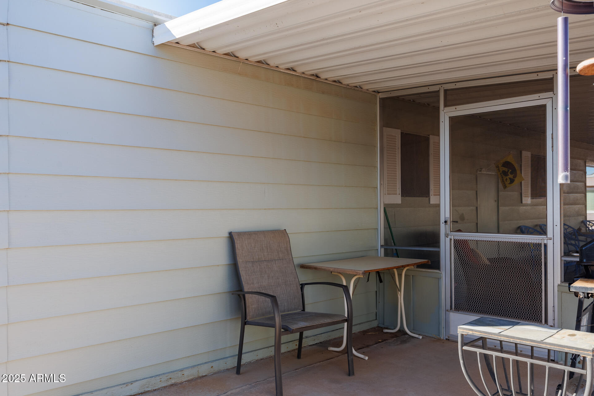 2100 North Trekell Road, Unit 333 Casa Grande, AZ 85122 - Photo 22 of 39 a view of a patio with table and chairs