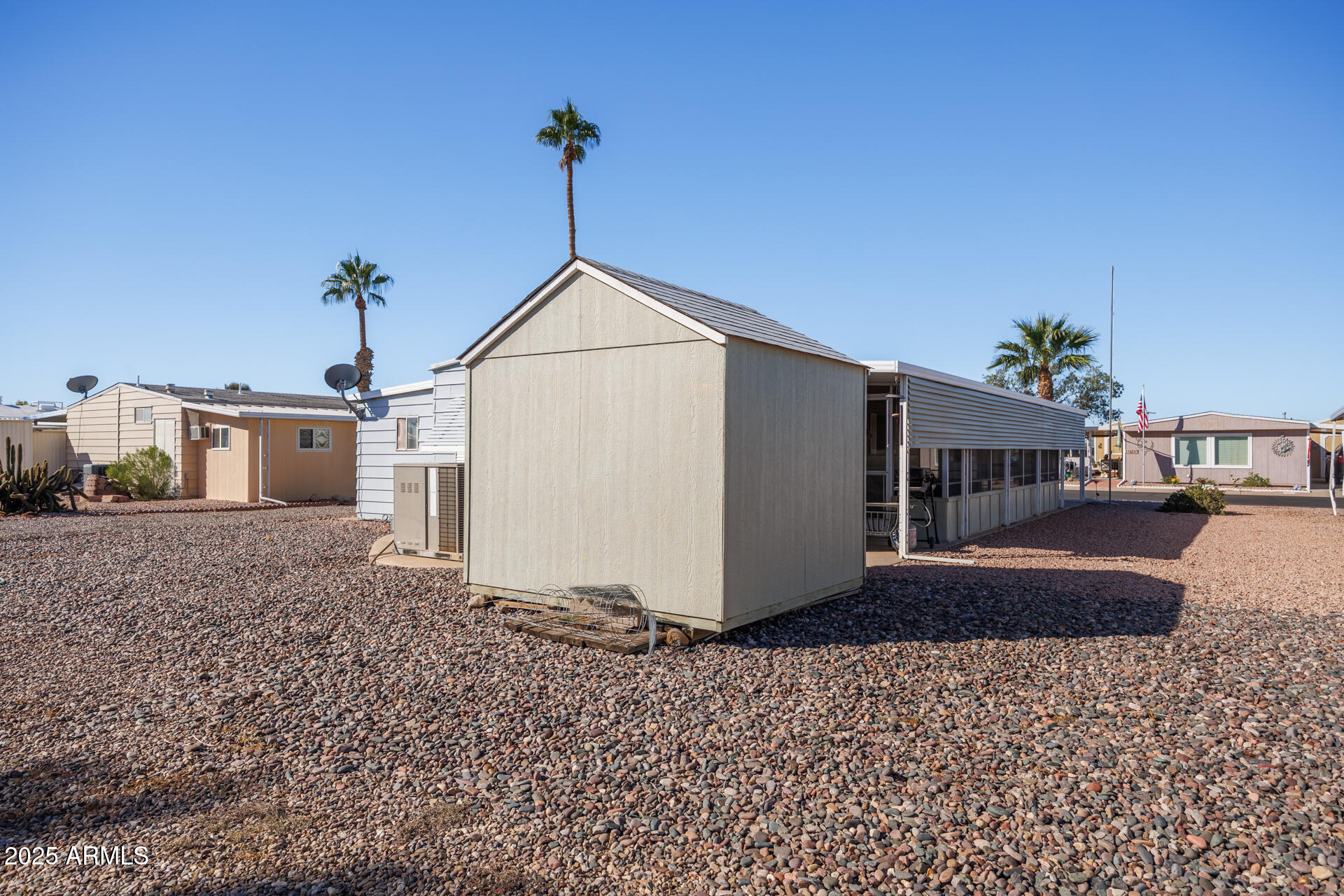 2100 North Trekell Road, Unit 333 Casa Grande, AZ 85122 - Photo 25 of 39 a front view of a house with a yard
