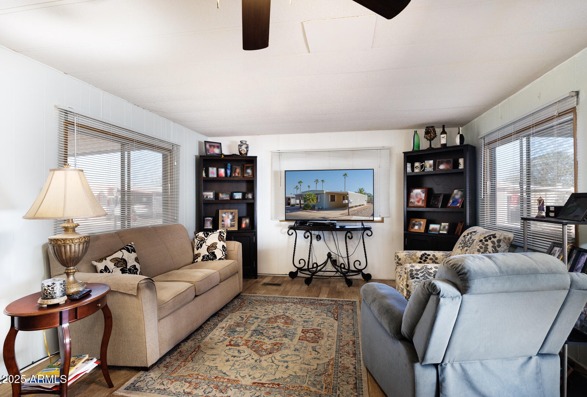 2100 North Trekell Road, Unit 333 Casa Grande, AZ 85122 - Photo 6 of 39 a living room with furniture and a flat screen tv