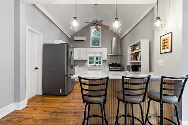 a view of a dining room with furniture