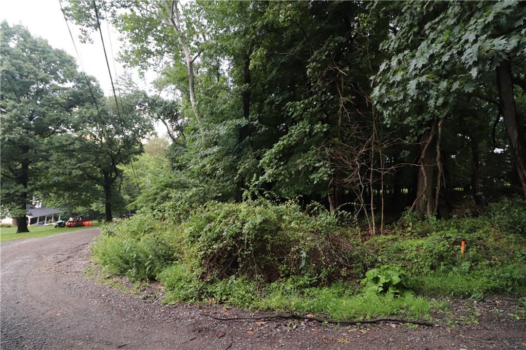415 Redgate Road Sewickley, PA 15143 - Photo 1 of 25 LOT 52 on Rhodes Ave is located only 2.5 miles from I79 or approx 1 mile from Rte 65. Close, yet so privately located.