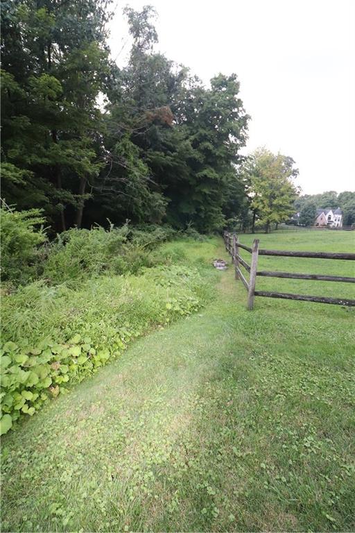 415 Redgate Road Sewickley, PA 15143 - Photo 11 of 25 View3 of bordering lane & neighbor's fence. LOT 52 to left in image